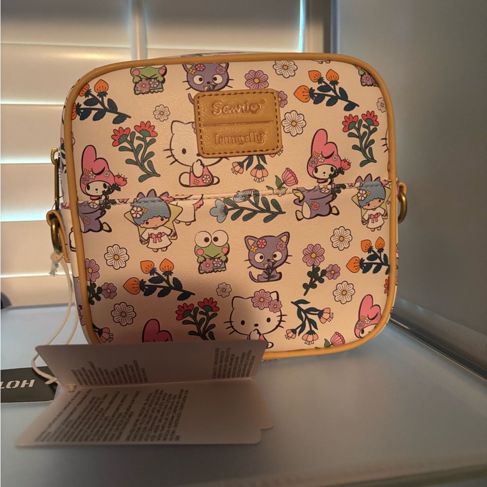 Loungefly Cream Crossbody Bag with Hello Kitty and Friends